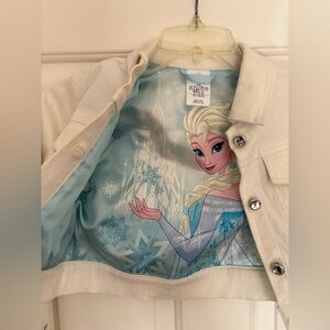 Disney’s Frozen cropped White Jean Jacket with Blue Snowflake Accents
